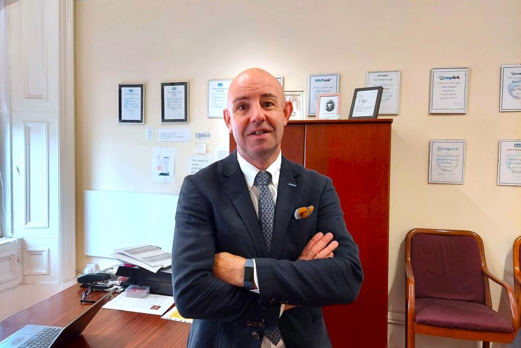 Mark with arms crossed